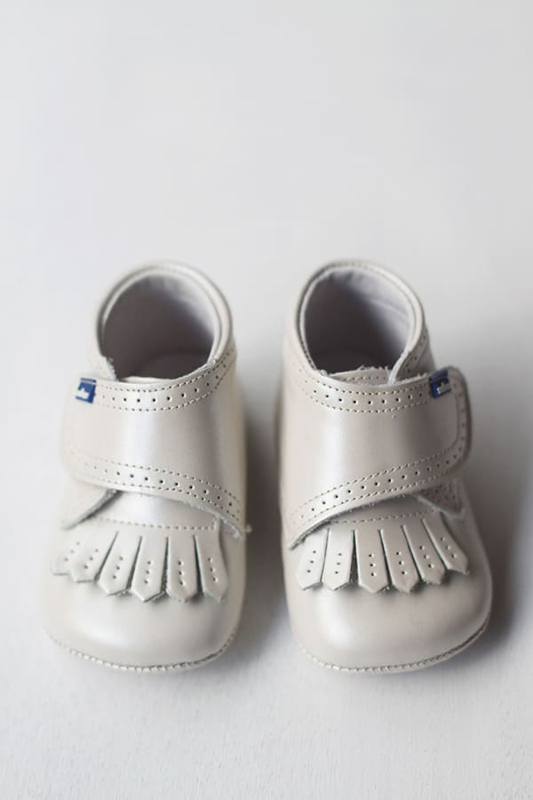 Chaussons frange cuir beige