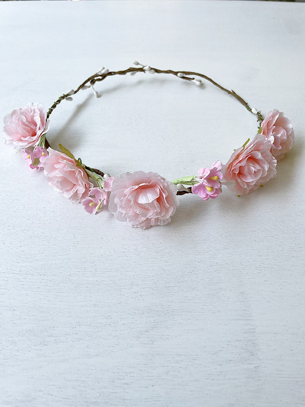 Couronne de fleurs roses artificielles pour petites filles à porter avec une robe de cérémonie pour enfant. Parfait pour sublimer une coiffure.